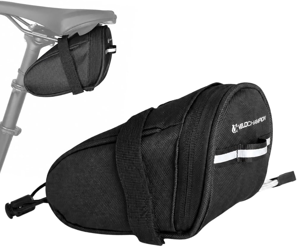 borsa-sottosella-bici-198qsc-1.jpg VeloChampion Borsa Sottosella Bici da 1 Litro, Borsa Bici Posteriore Nera | Borsello Riflettente e Impermeabile per MTB, Corsa ed E Bike, Portaoggetti per Kit di Riparazione e Accessori da Ciclismo : Amazon.it: - immagine 1
